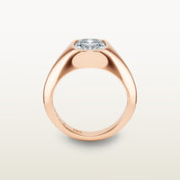 An 18k rose gold ring featuring a cushion-cut diamond in a soft bezel setting, with a smooth, tapered band, engraved with “SULA 18K” on the inside