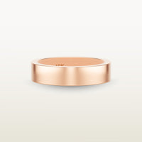 A minimalist 18k rose gold band with a flat profile and 90 degree edge. 