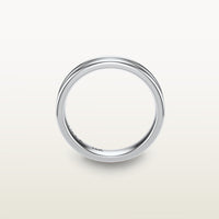A refined 18k white gold band with a faded channel setting, engraved with “SULA 18K” on the inside.