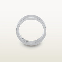 A minimalist 18k white gold band with a flat profile and 90 degree edge, engraved with “SULA 18K” on the inside.
