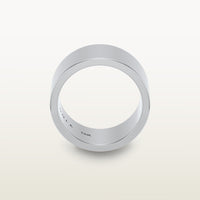 A bold, cigar band-style ring in 18k white gold with a wide, flat-edge profile and minimalist silhouette, engraved with “SULA 18K” on the inside.