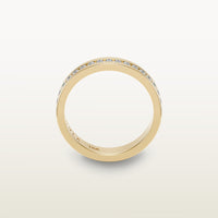 An 18k yellow gold eternity band featuring round brilliant diamonds in a sleek channel setting, engraved with “SULA 18K” on the inside.