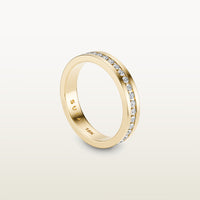 An 18k yellow gold eternity band featuring round brilliant diamonds in a sleek channel setting, engraved with “SULA 18K” on the inside.