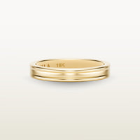 A refined 18k yellow gold band with a faded channel setting, engraved with “SULA 18K” on the inside.