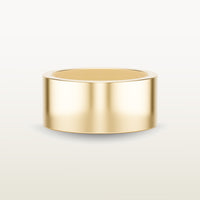 A bold, cigar band-style ring in 18k yellow gold with a wide, flat-edge profile and minimalist silhouette.